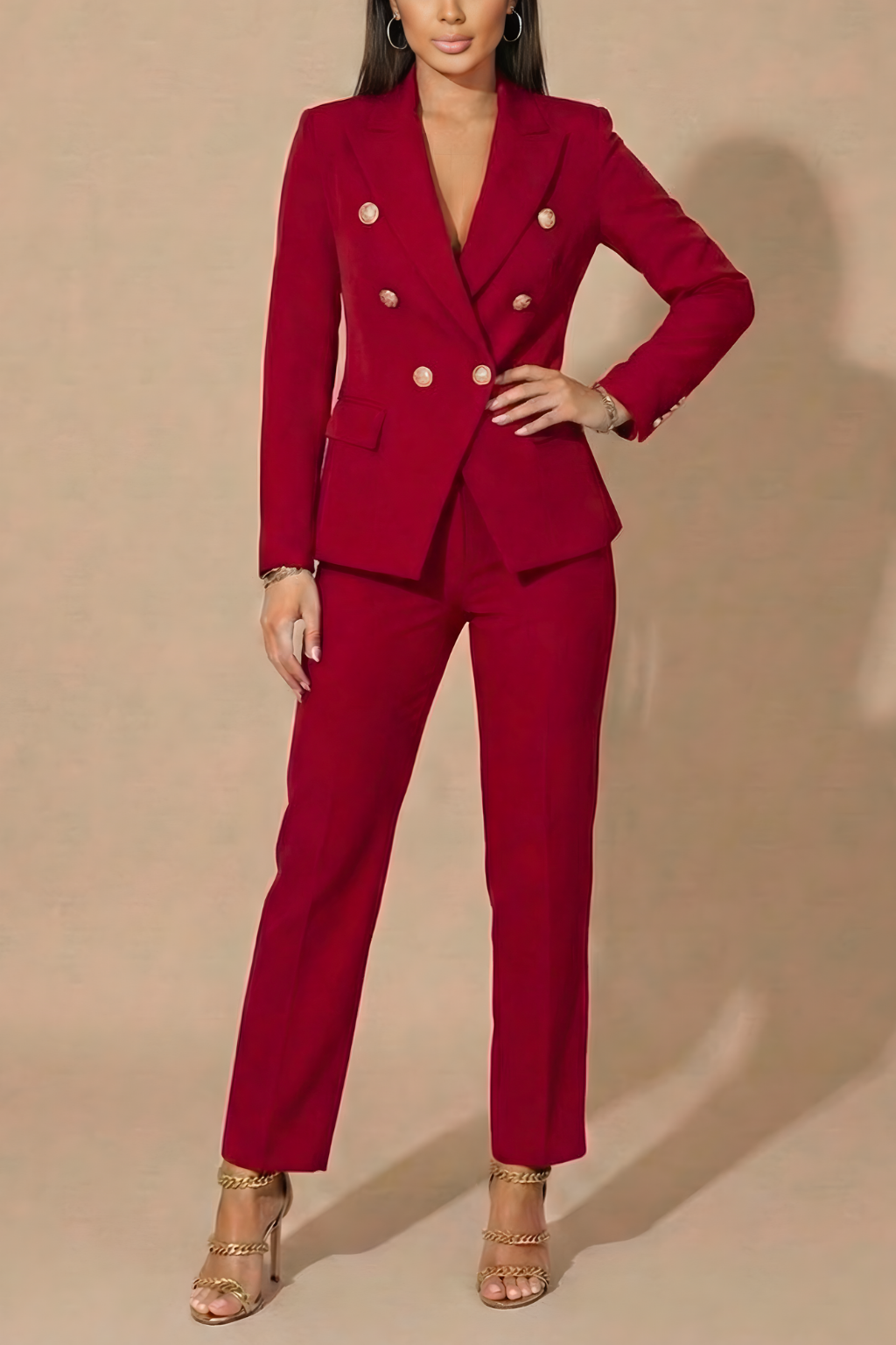 Red double-breasted suit with gold buttons for an office holiday party