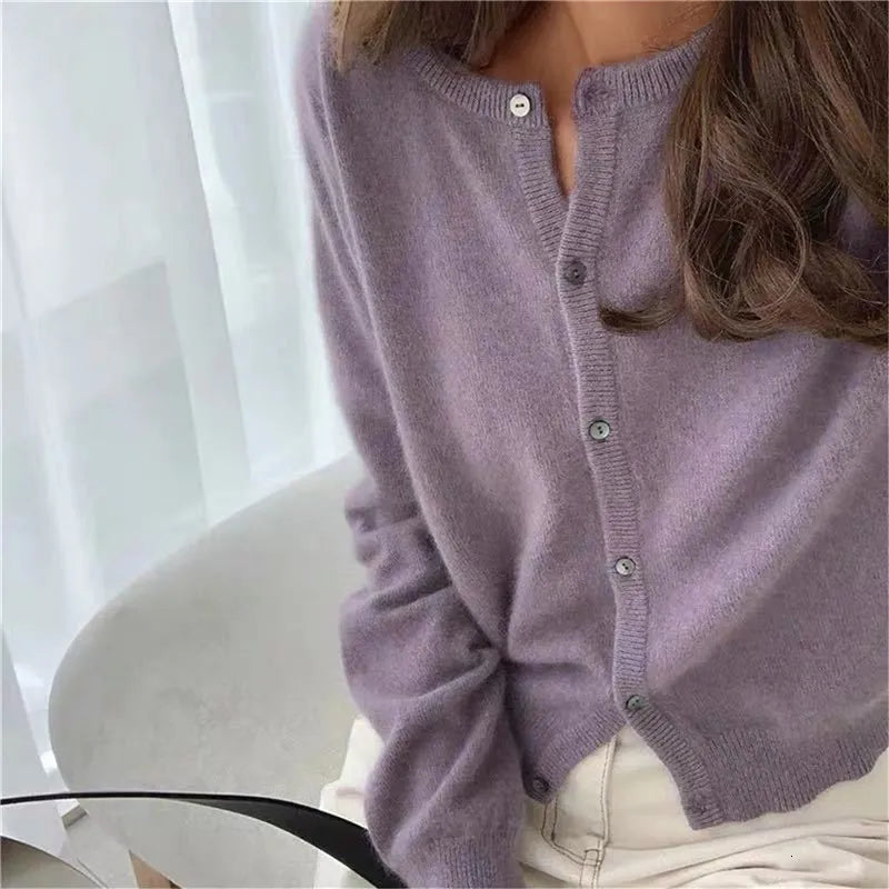 Single Breasted Solid Round Neck Knitted Cardigan

Modified Title: One Buttoned Plain Circular Neck Knitted Cardigan – view 10