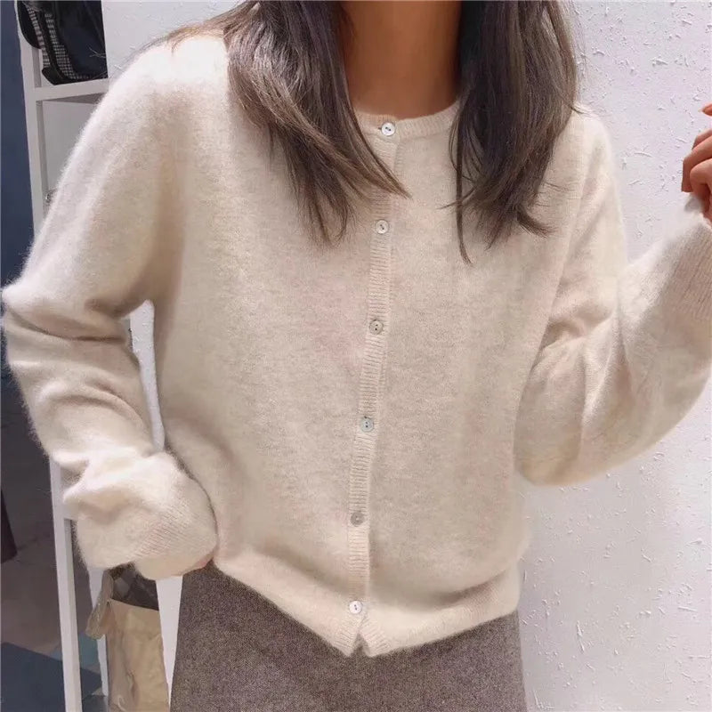 Single Breasted Solid Round Neck Knitted Cardigan

Modified Title: One Buttoned Plain Circular Neck Knitted Cardigan – view 8