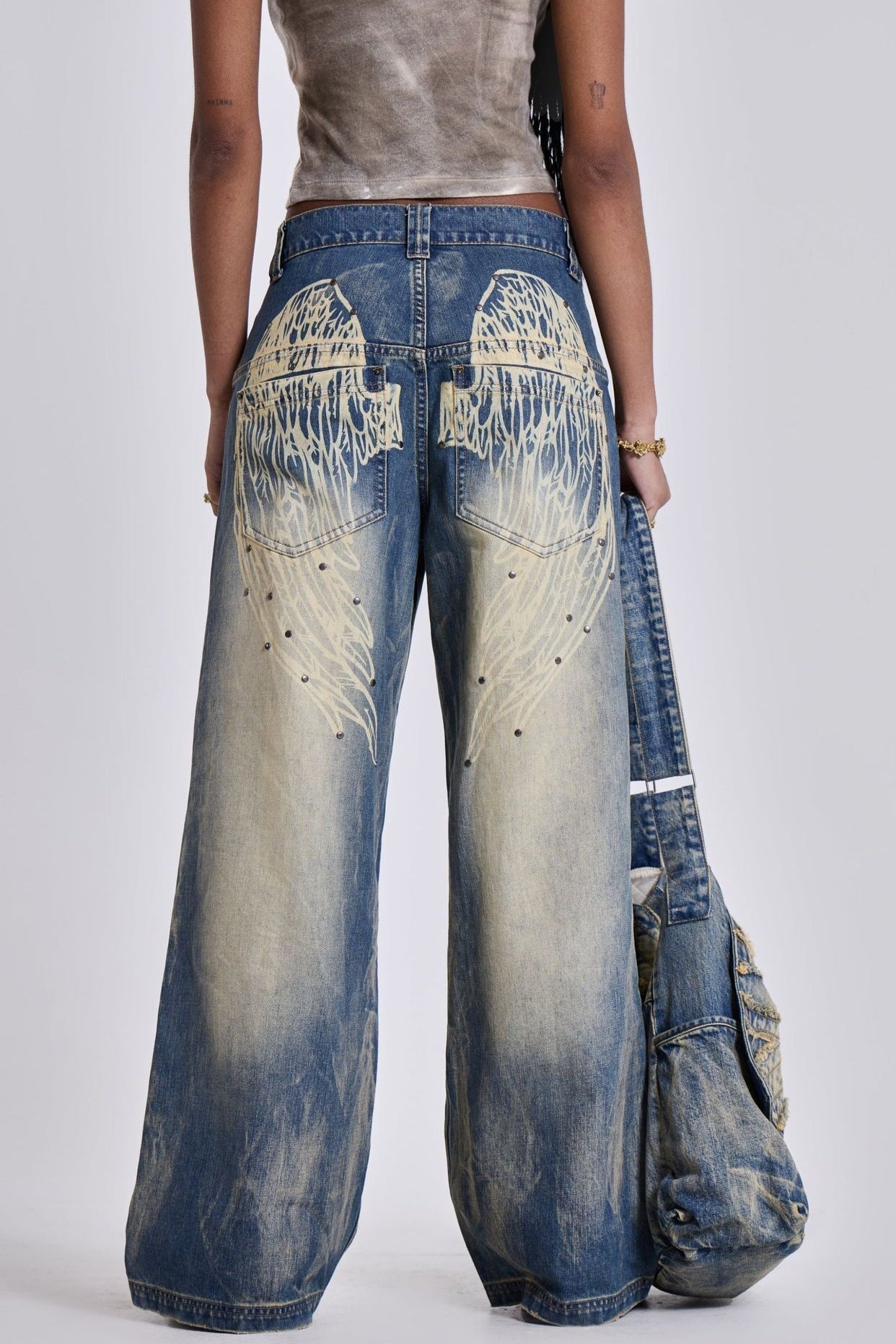 Vintage Faded Wing Print Baggy Jeans
