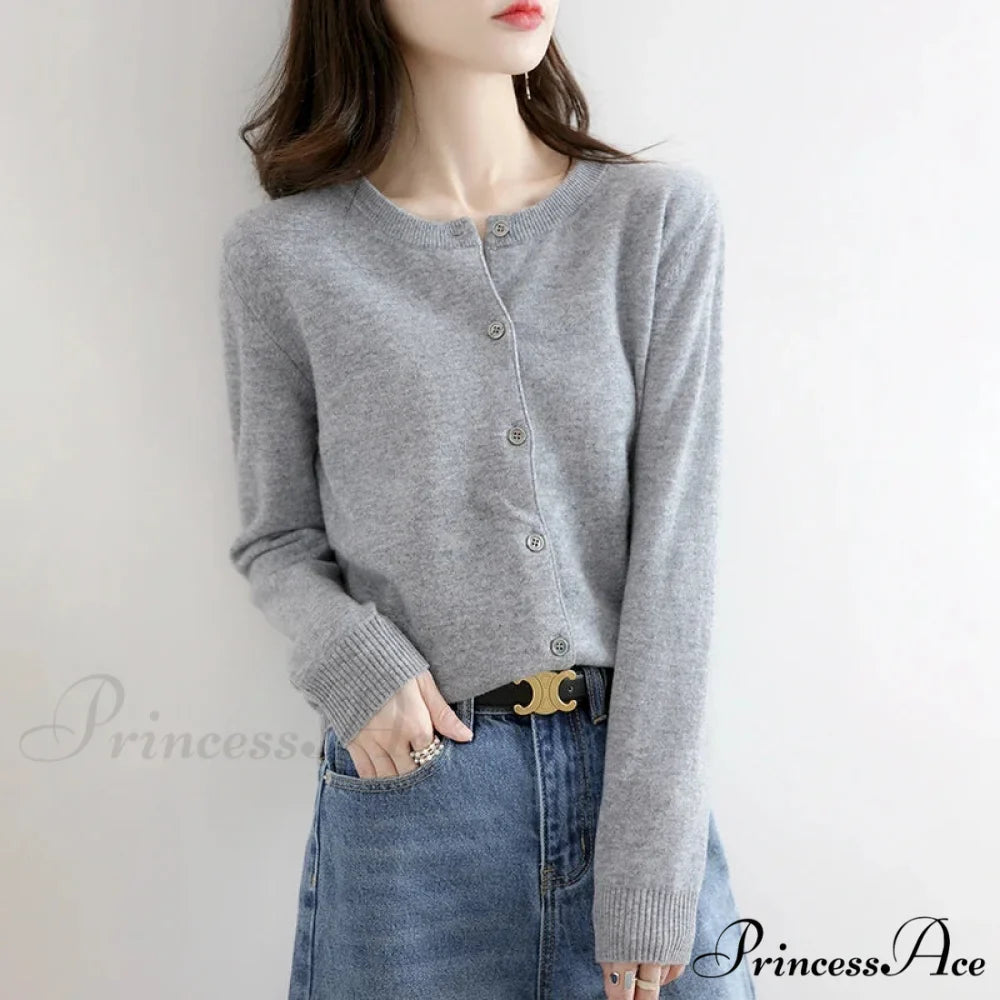 Brief Thin Circular Neck One Buttoned Gold Tan Knitted Cardigan