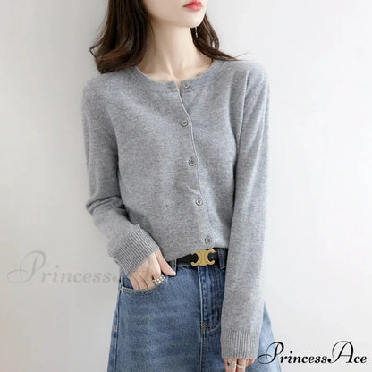 Brief Thin Circular Neck One Buttoned Gold Tan Knitted Cardigan
