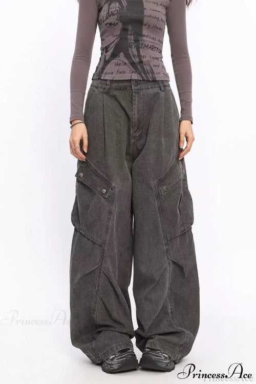Woman wearing Black Denim Wide-Leg Cargo Pants from Hicosy