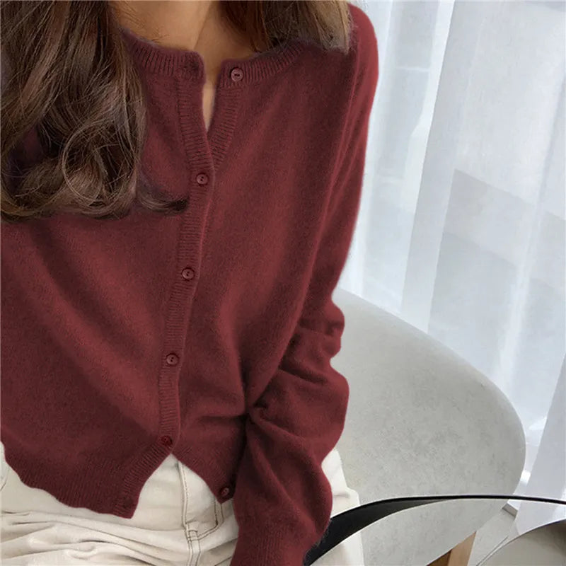 Single Breasted Solid Round Neck Knitted Cardigan

Modified Title: One Buttoned Plain Circular Neck Knitted Cardigan – view 13