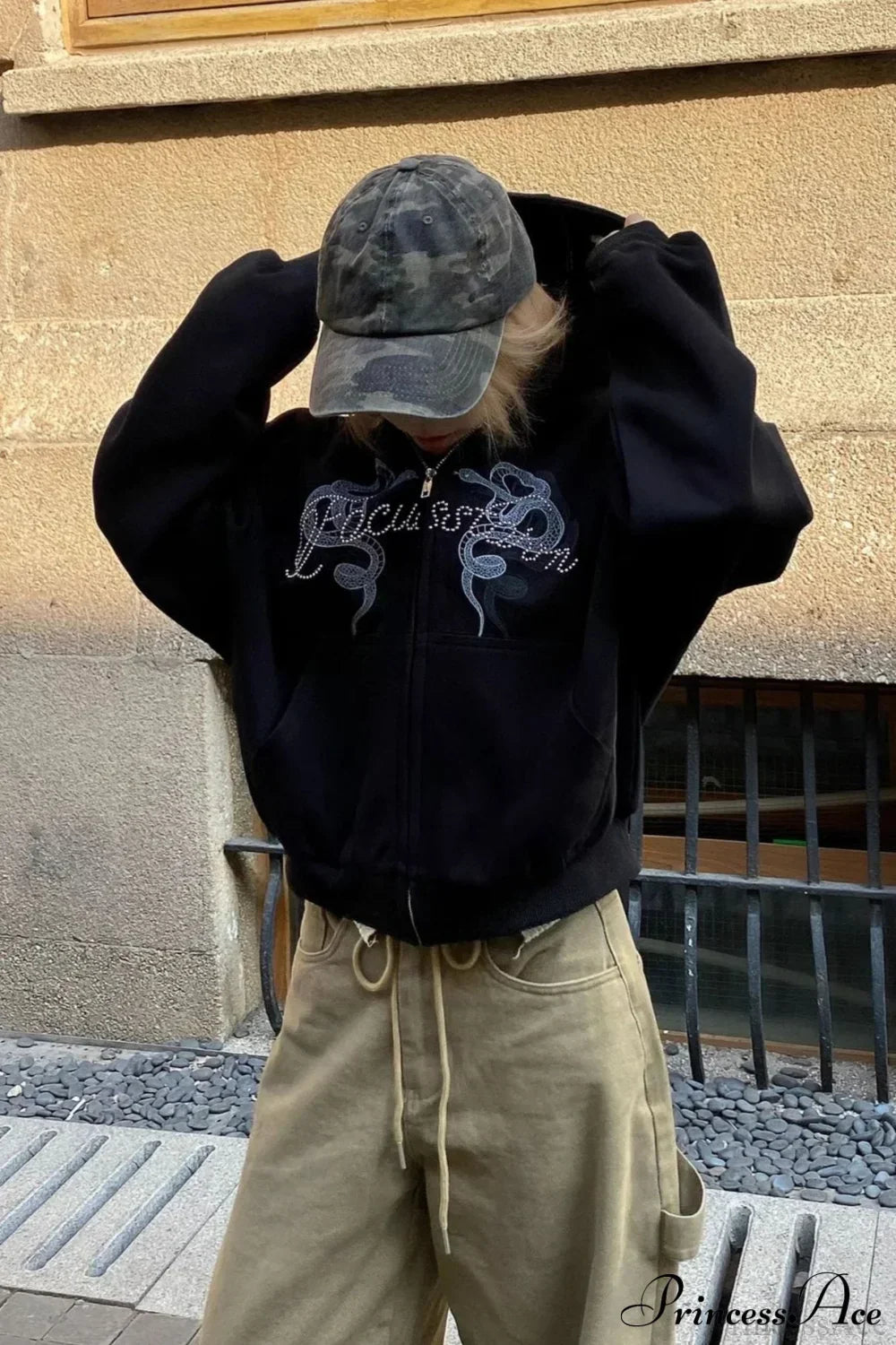 Woman wearing Snake-Print Rhinestone Crop Hoodie from Hicosy