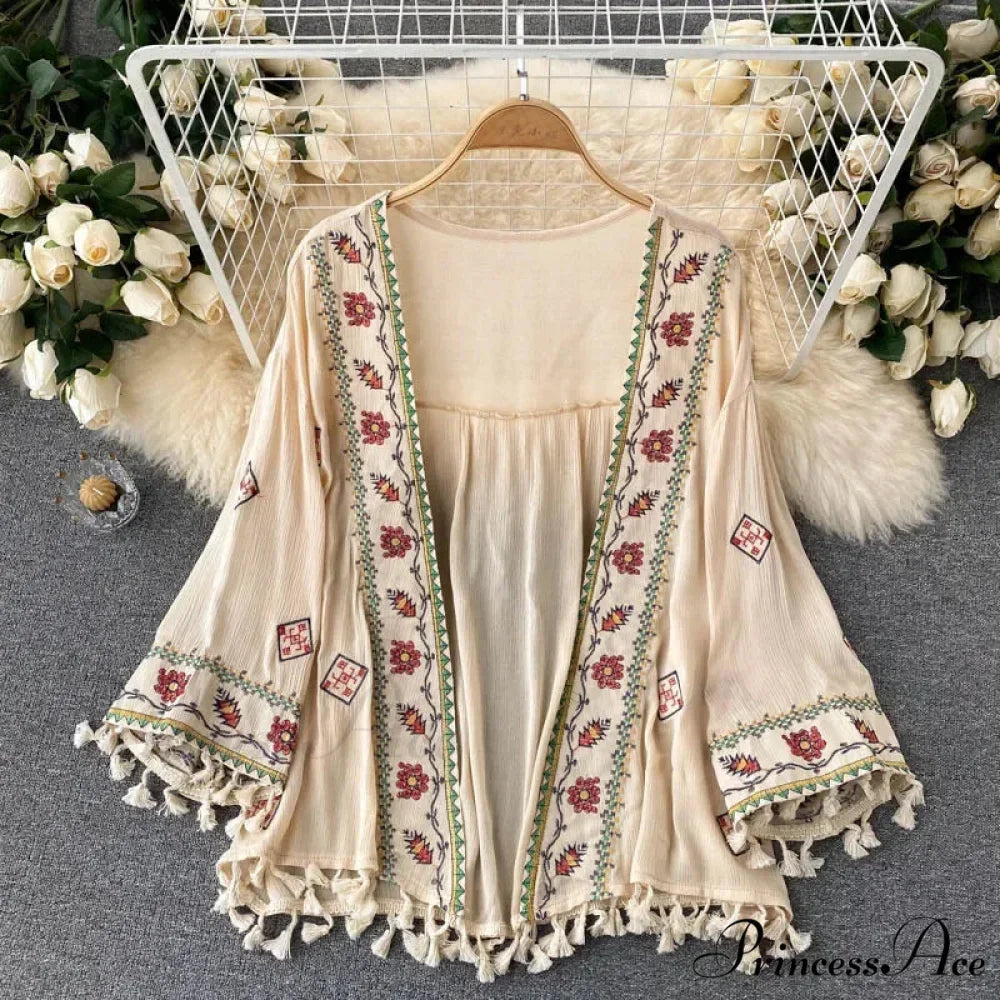 White Cotton Rayon Floral Embroidery Beach Cover up

Modified Title: Ivory Cotton Rayon Botanical Stitching Beach Cover up